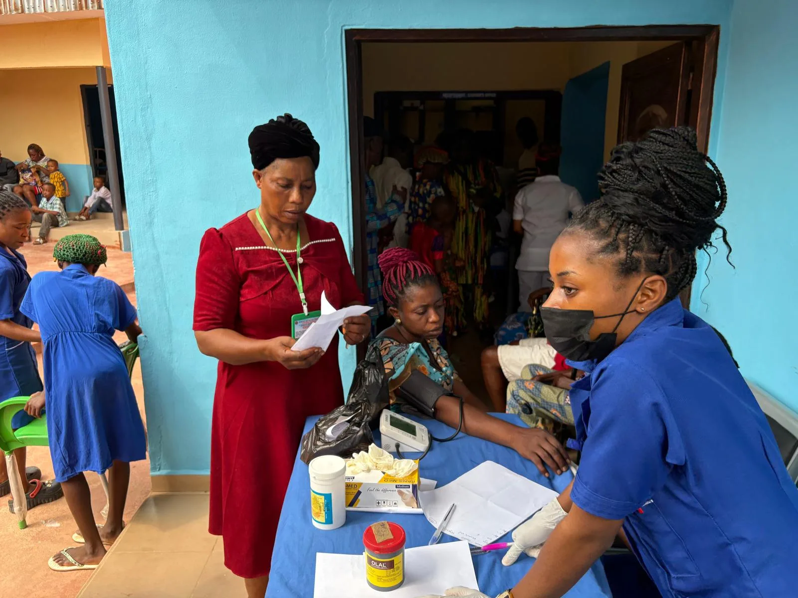 Clinical staff attending to patients during a clinic day
