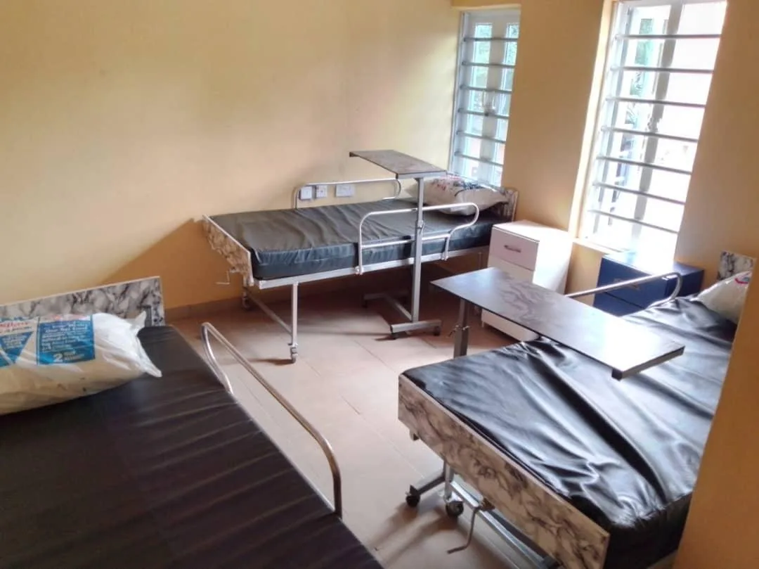Beds made up and ready on a hospital ward